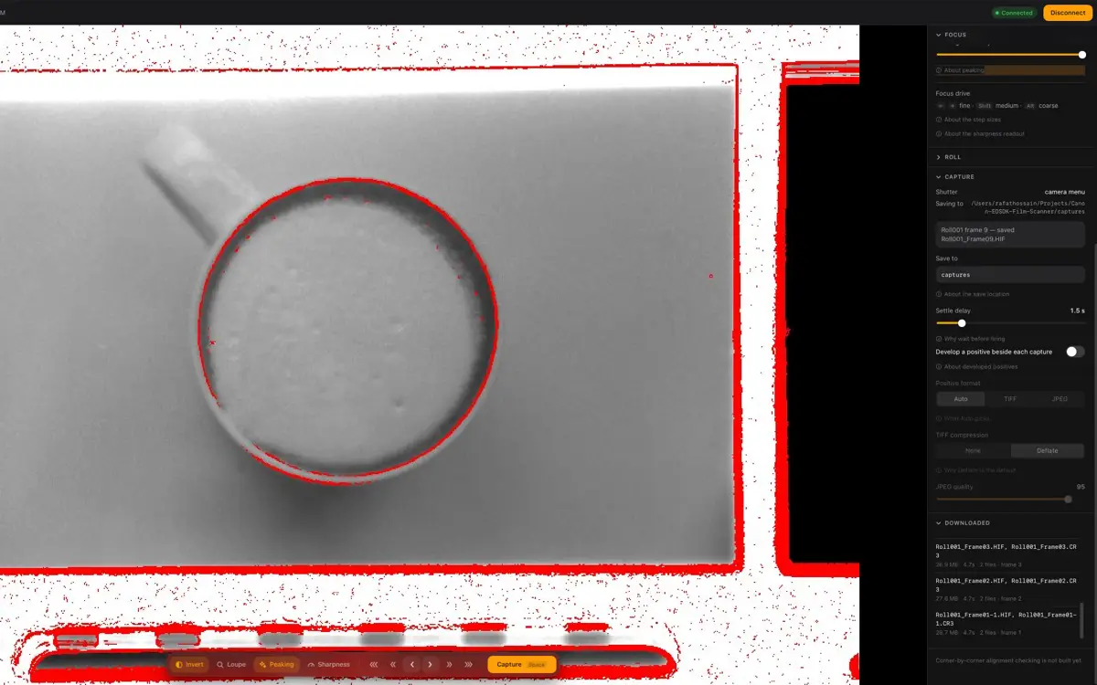 Film Scanner app showing a live negative preview with focus peaking highlighted in red and capture controls on the right.